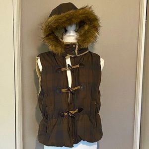 Vest with faux fur hood